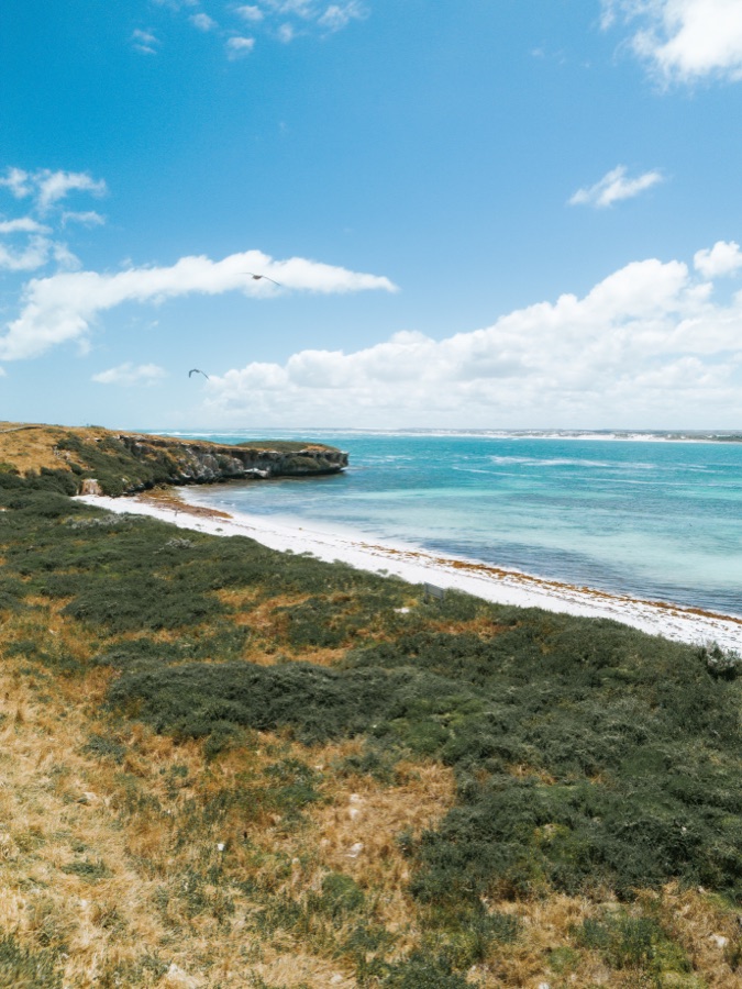 Aerial view of turquoise water and white sand around Lancelin Island